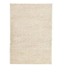 Tapis shaggy à poils longs moderne doré 140x200 cm